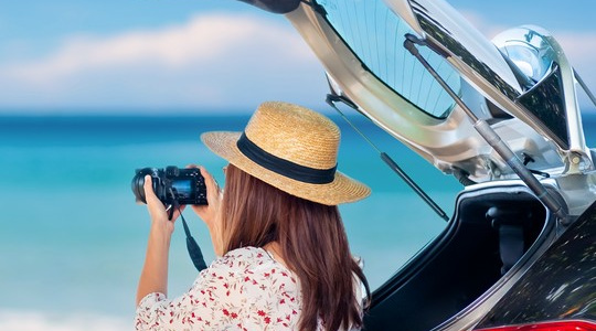 Photographe sur la plage